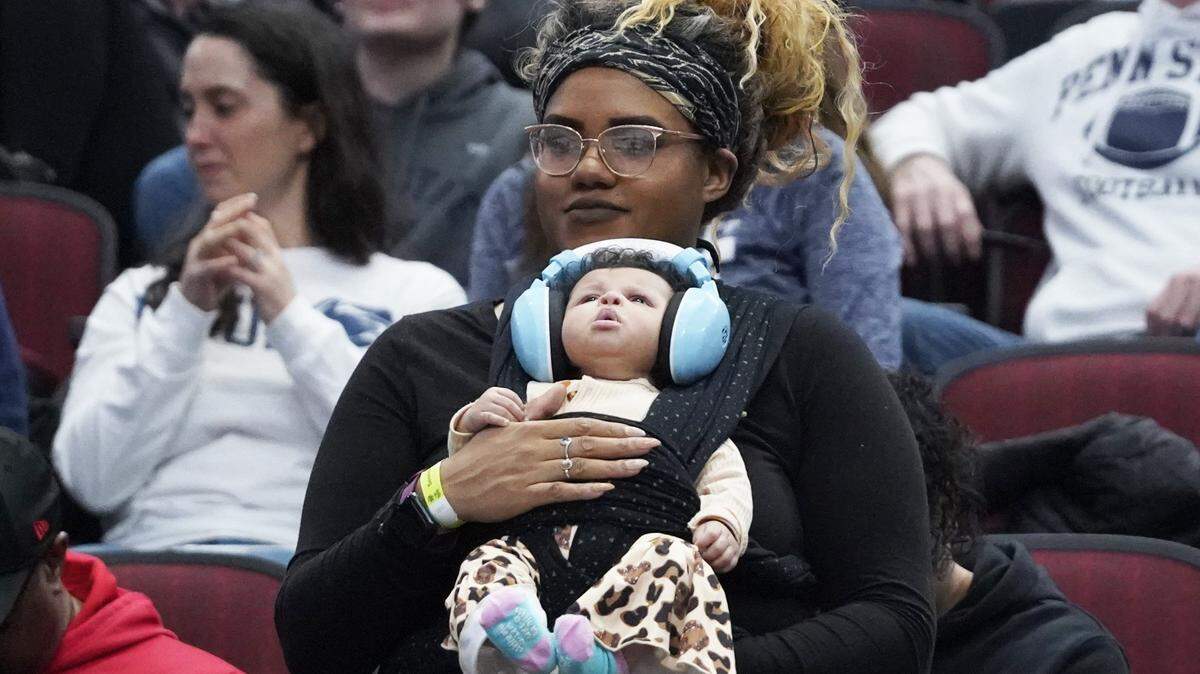 Mar 11, 2023; Chicago, IL, USA; Two Penn State Nittany Lions fans during the second half of their game against the Indiana Hoosiers at United Center. Mandatory Credit: David Banks-USA TODAY Sports