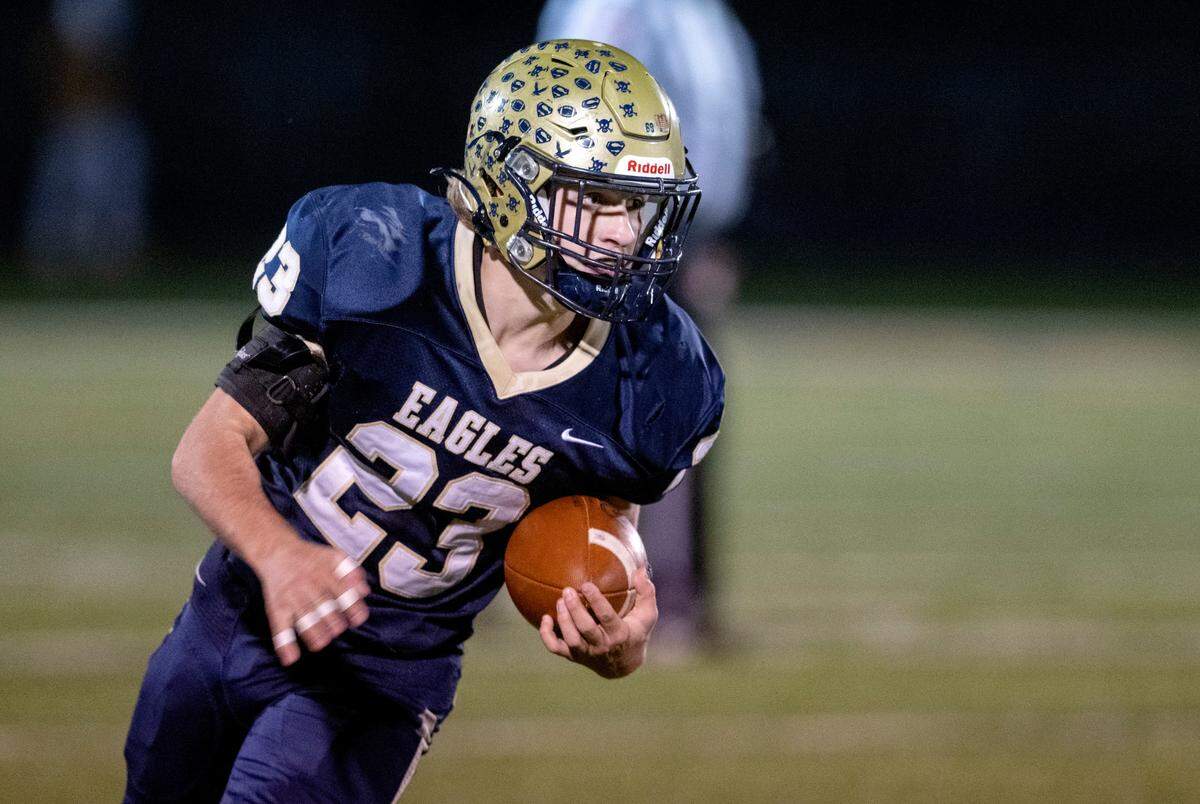 Bald Eagle Area’s Gavin Eckley runs with the ball during the game against Purchase Line on Friday, Oct. 28, 2022.