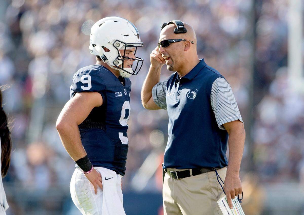 Penn State football coach James Franklin talks to quarterback Trace McSorley during the Saturday, September 3, 2016 game in Beaver Stadium.