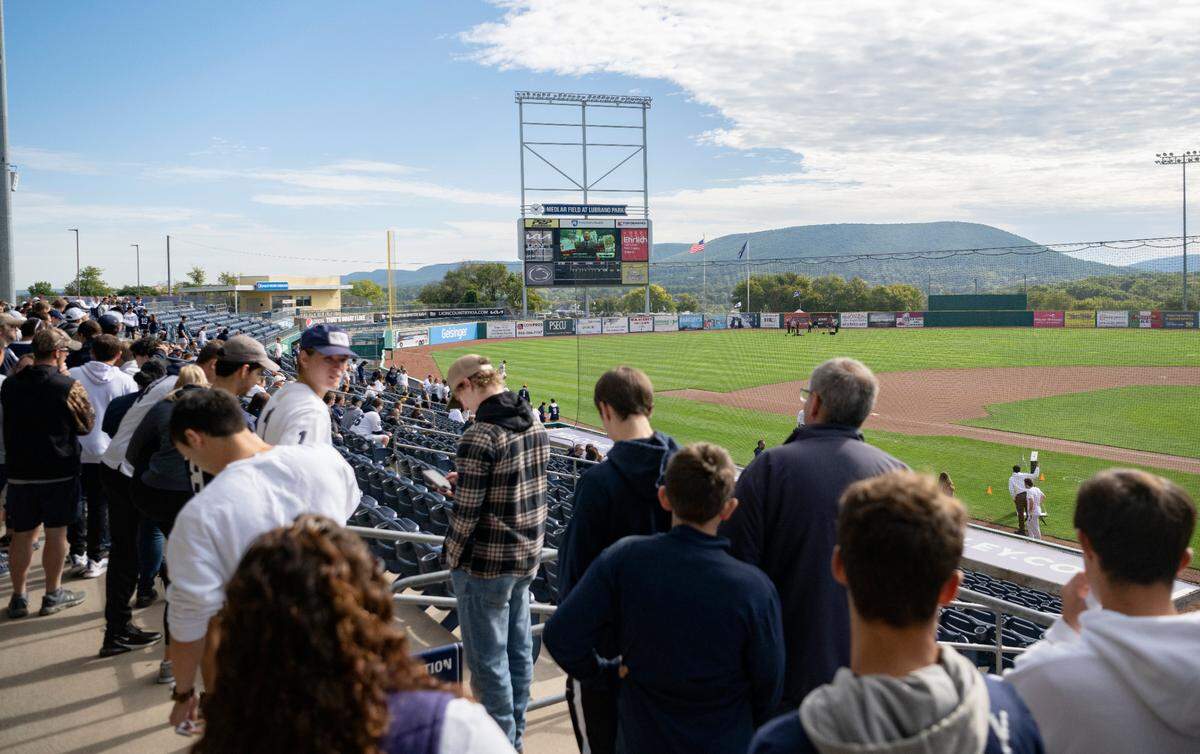 Penn State fans try to beat Chad Powers 40-yard dash time at Medlar Field before the football game on Saturday Sept. 24, 2022.