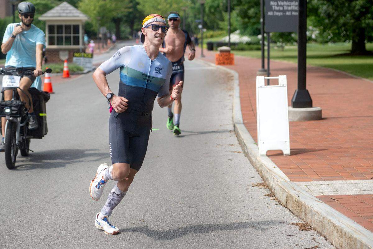 Kiel Bur competes in the 13.1 mile run for the Ironman 70.3 Pennsylvania Happy Valley on Sunday, June 30, 2024. Bur finished first in the race with a time of 4:25:02.