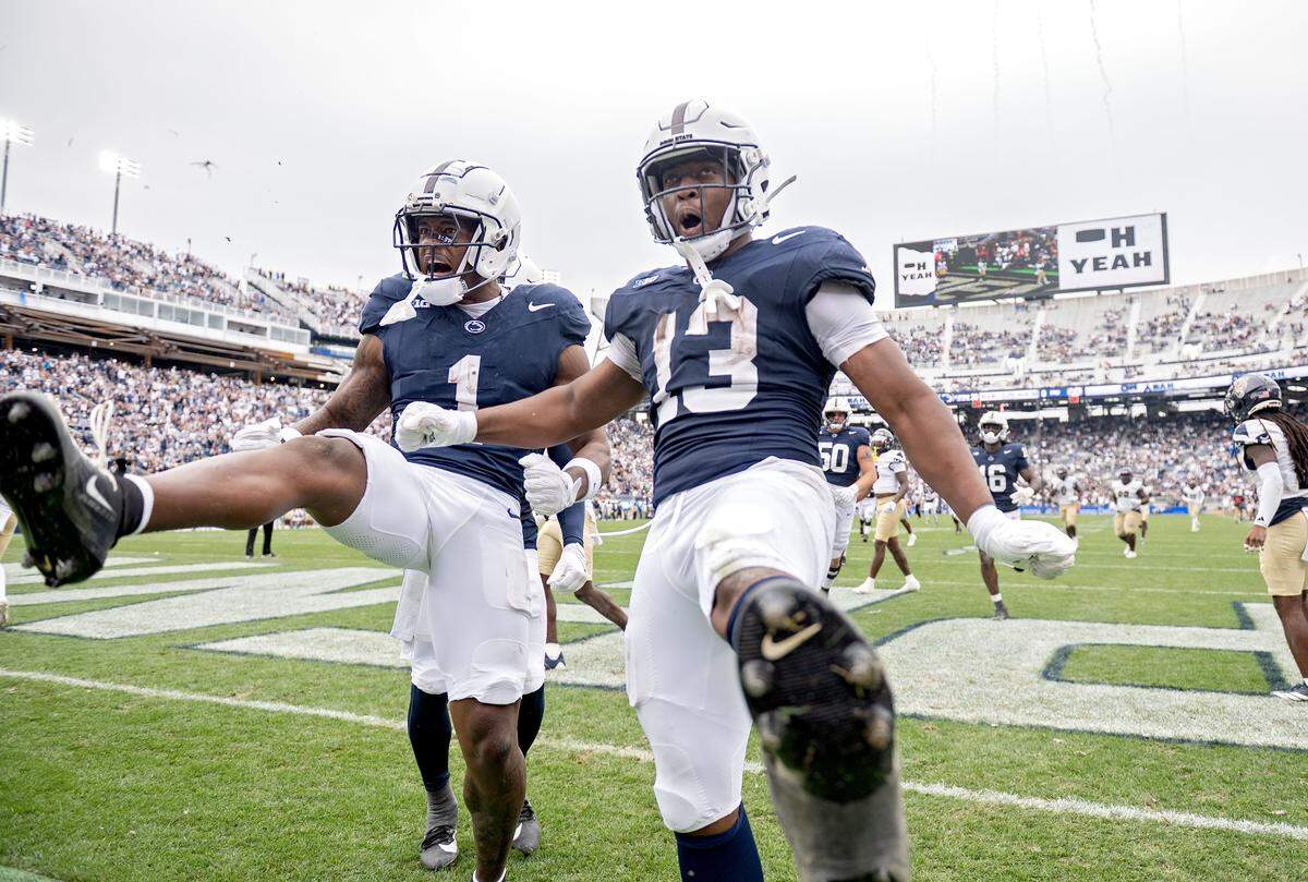Penn State wide receiver Kyron Hudson and running back Kaytron Allen celebrate Allen’s touchdown during the game against FIU on Saturday, Sept. 6, 2025 at Beaver Stadium.  