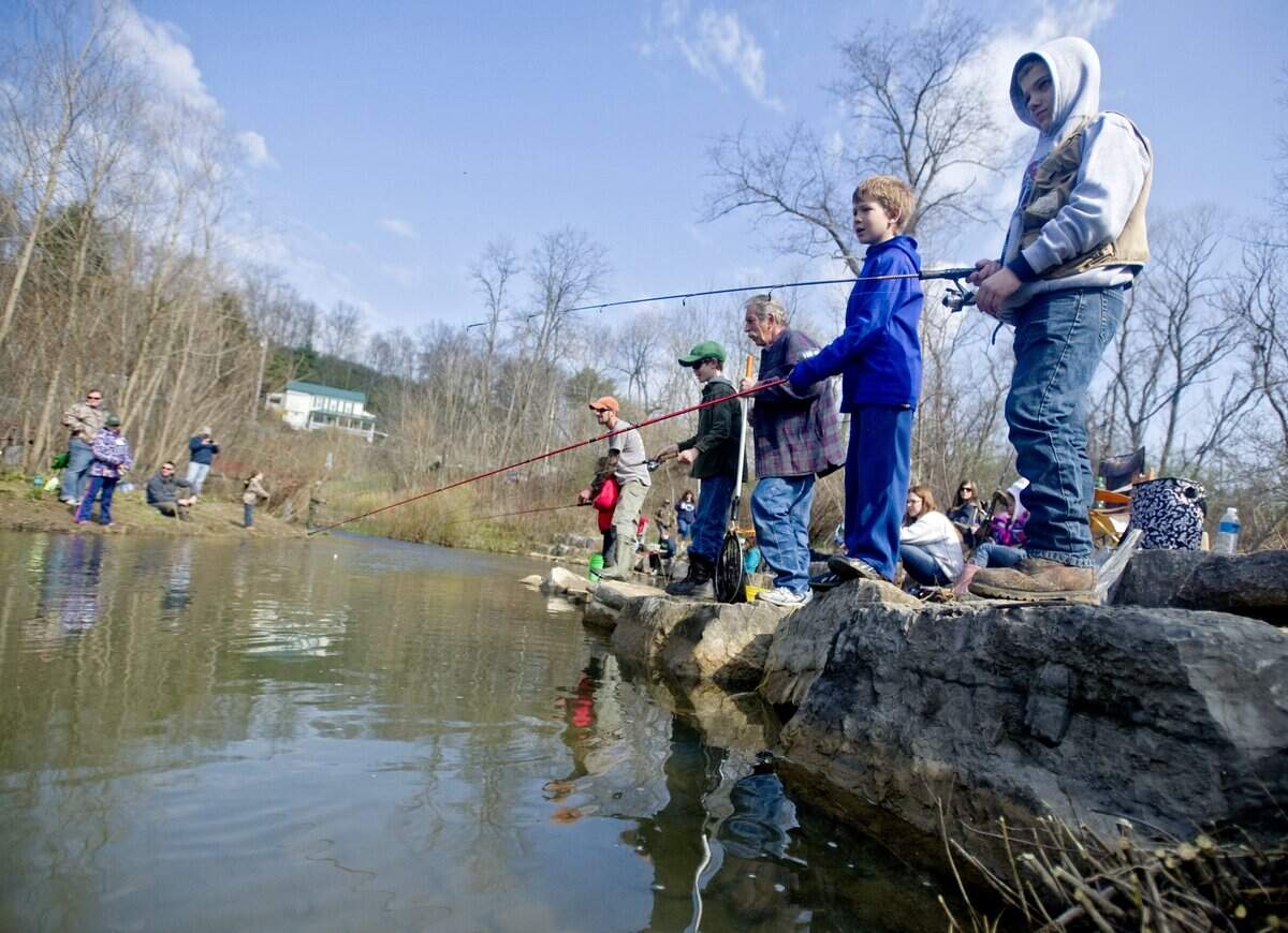 Hunter Dumondhatton, 12, fishes during the 30th annual Port Matilda Children's Fishing Derby on Saturday, April 26, 2014.