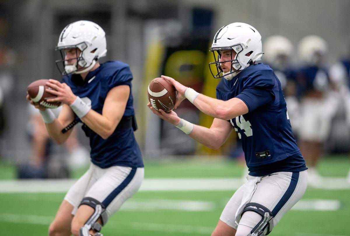 Penn State quarterback Sean Clifford gets the ball to make a pass during practice on Friday, Dec. 17, 2021.