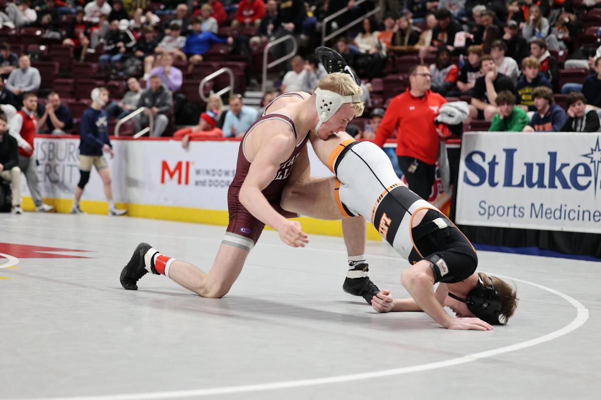 State College’s Pierson Manville controls Greater Latrobe’s Nate Roth in their 139-pound quarterfinals match of the PIAA Class 3A Championships on Friday, March 10, 2023 at the Giant Center in Hershey. Manville pinned Roth in 1:16.