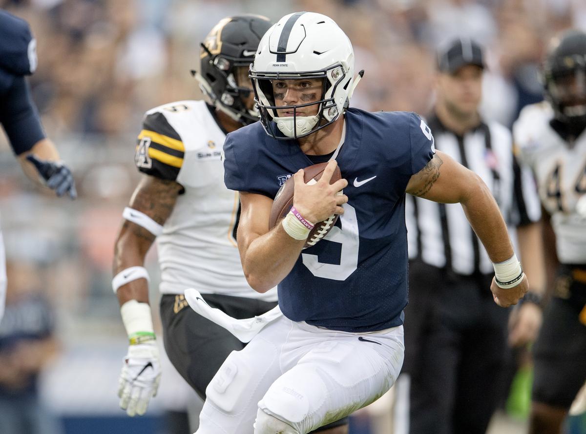 Penn State quarterback Trace McSorley runs for a touchdown with the ball during the Saturday, Sept. 1, 2018 game at Beaver Stadium.