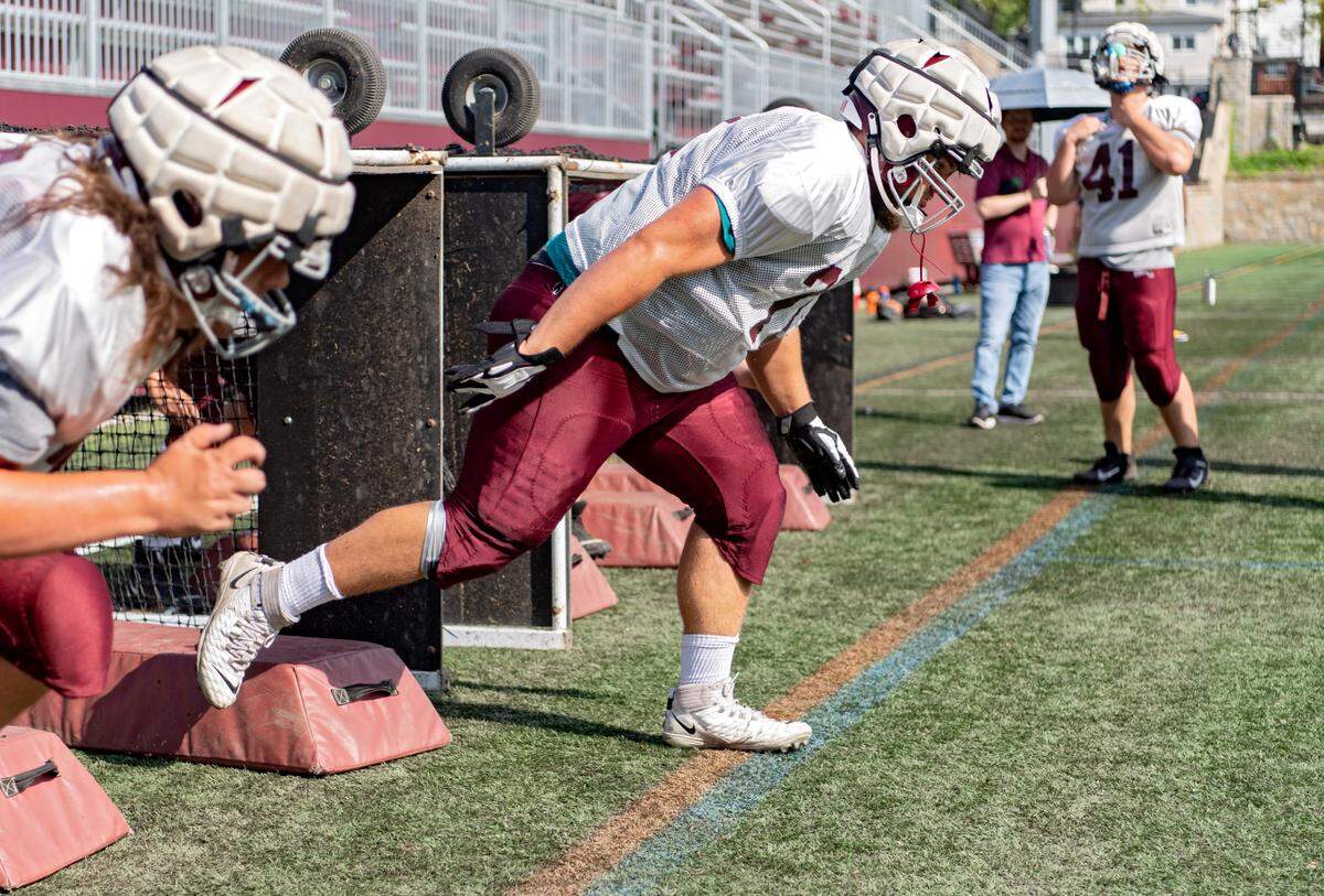 State CollegeÕs Michael Dincher runs a drill during practice on Friday, Aug. 20, 2021.