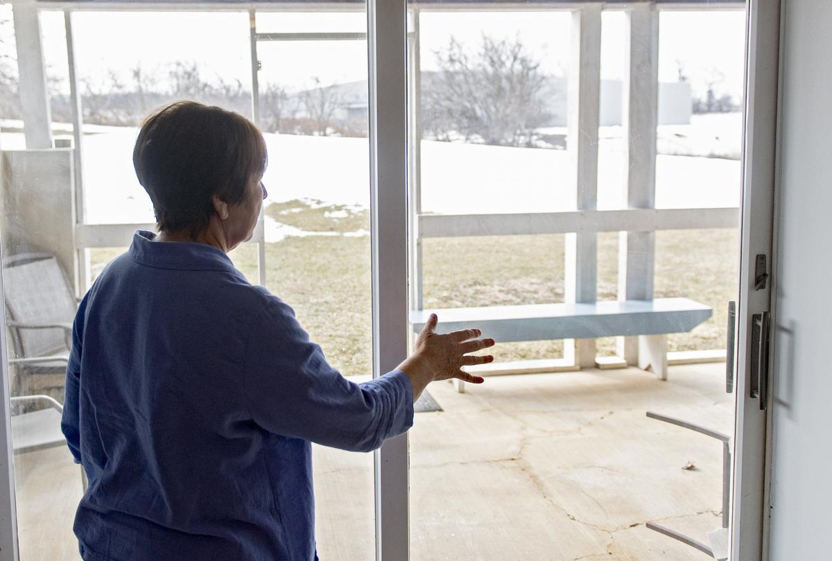 ACRES Project Executive Director Bellamarie Bregar points out where they hope to build a greenhouse on the Bernel Road property.