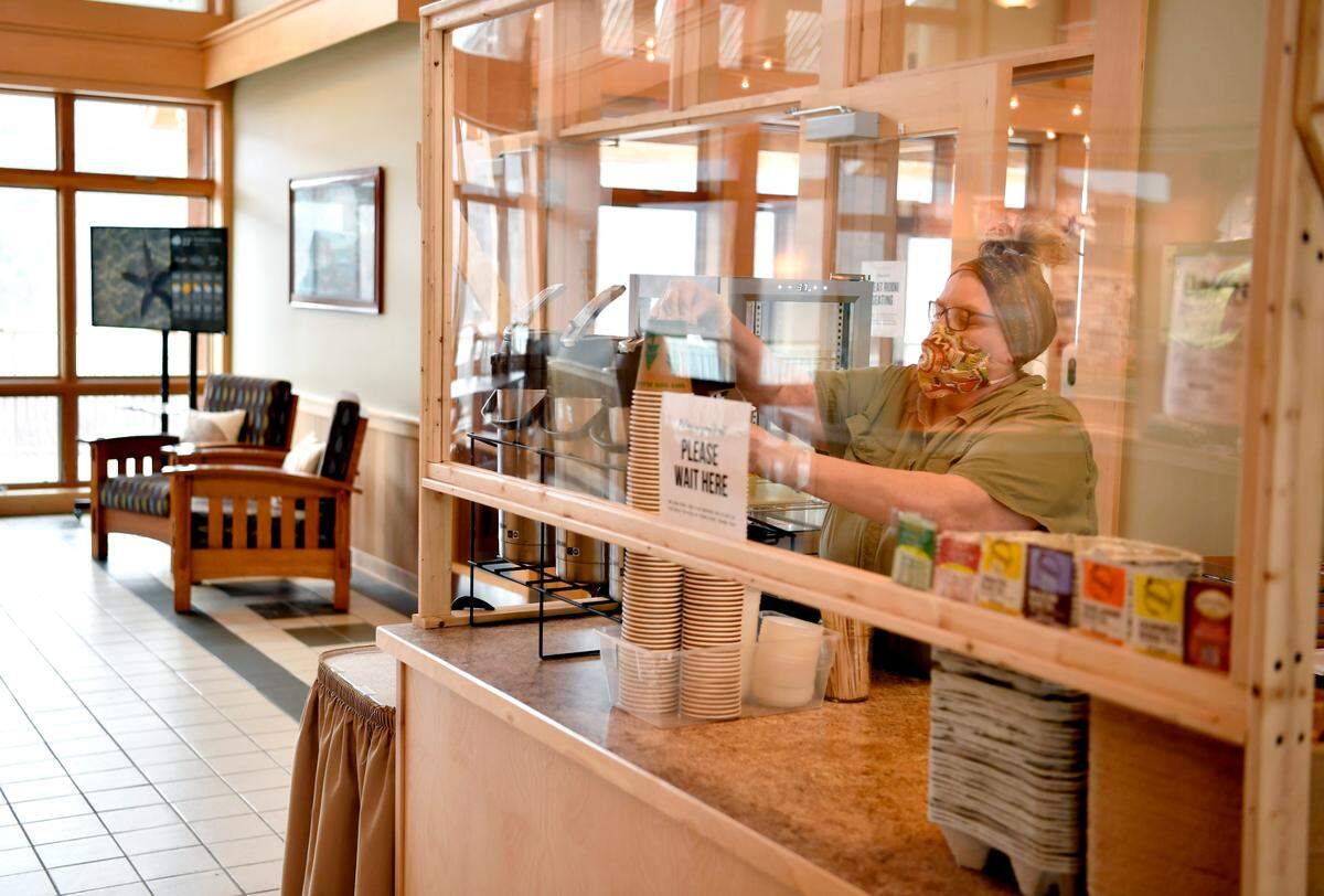 Sharon Bitner pours a coffee for a guest at The Nature Inn at Bald Eagle State Park on Friday, Jan. 29, 2021.