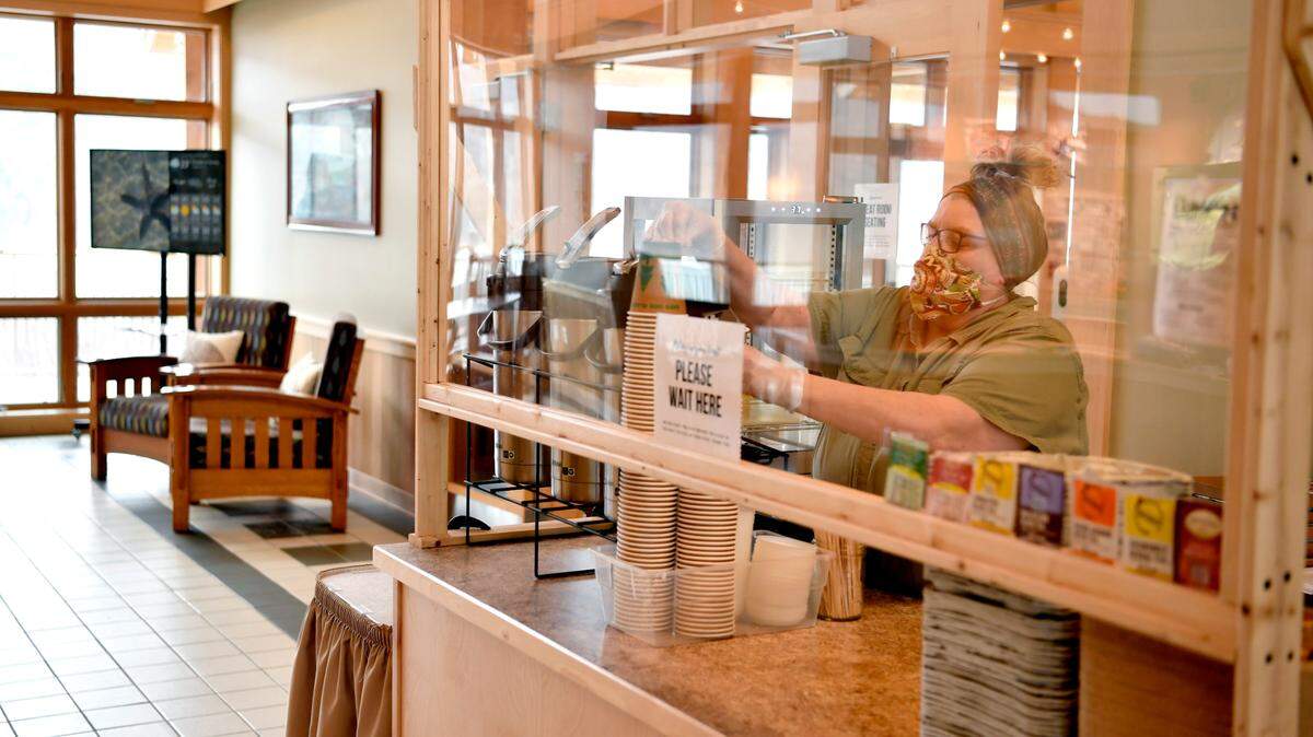 Sharon Bitner pours a coffee for a guest at The Nature Inn at Bald Eagle State Park on Friday, Jan. 29, 2021.