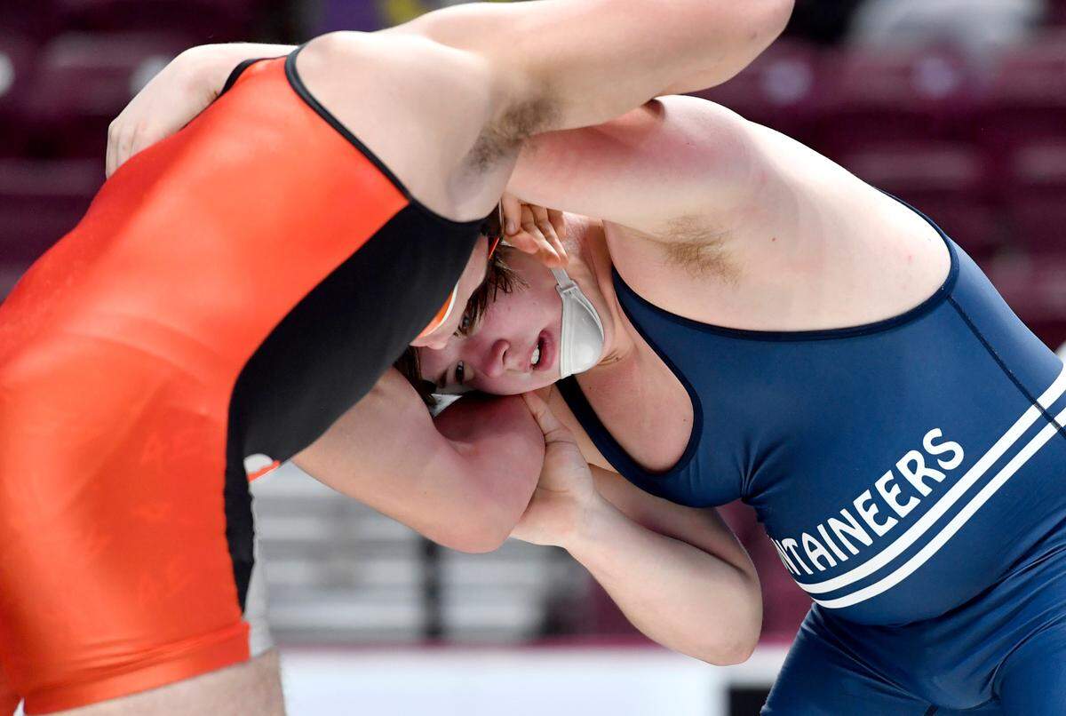 Philipsburg-Osceola’s Parker Moore wrestles Corry’s Hayden Linkerhof in the 215 lb seventh place bout at the PIAA AA wrestling championships on Friday, March 12, 2021 at the Hershey Giant Center.