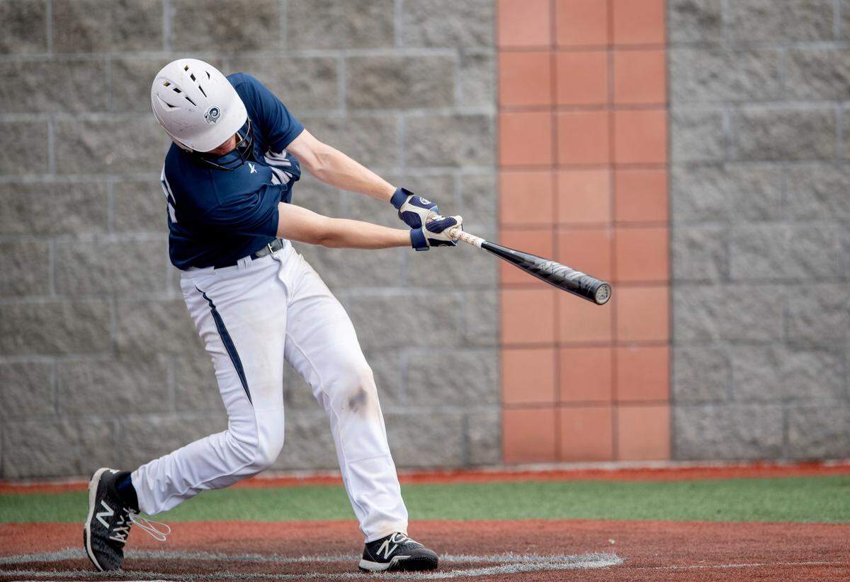 Penns Valley’s Dakota Brodzina hits a double that scores a run during the game against Punxsutawney PIAA playoffs at Showers Field in DuBois. Punxsutawney won, 8-2.