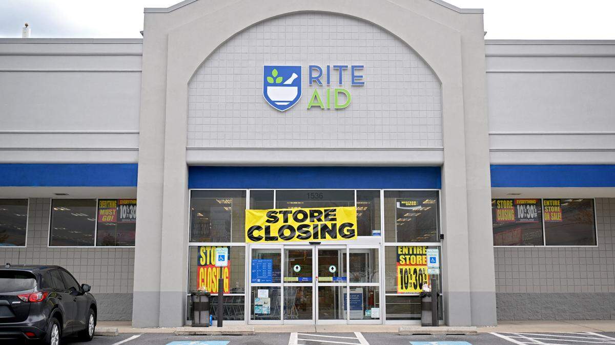 Store closing signs hang at the Rite Aid at 1536 N Atherton Street on Wednesday, April 10, 2024.