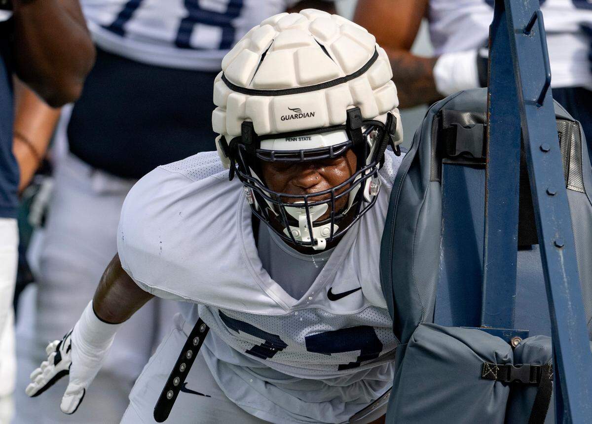 Penn State offensive lineman Sal Wormley runs a drill during practice on Wednesday, Aug. 10, 2022.
