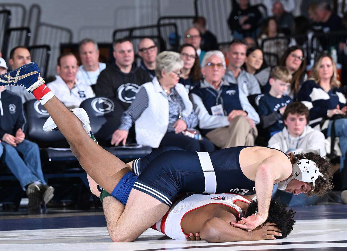 Penn State’s Levi Haines racks up riding time against American’s Caleb Campos at 174 lbs during the Friday, Feb. 21, 2025 match at Rec Hall in State College. Haines defeated Campos by a pin-fall. Penn State defeated American University, 50-3.