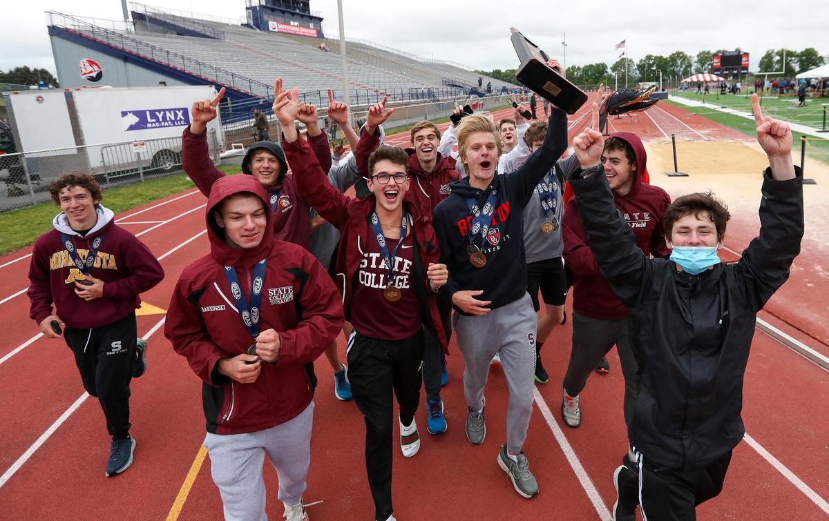 The State College boys’ track and field team takes a victory lap after securing the Class 3A team championship title during the PIAA State Track and Field Championships held Saturday, May 29, 2021, at Seth Grove Stadium on the Shippensburg University campus in Shippensburg.