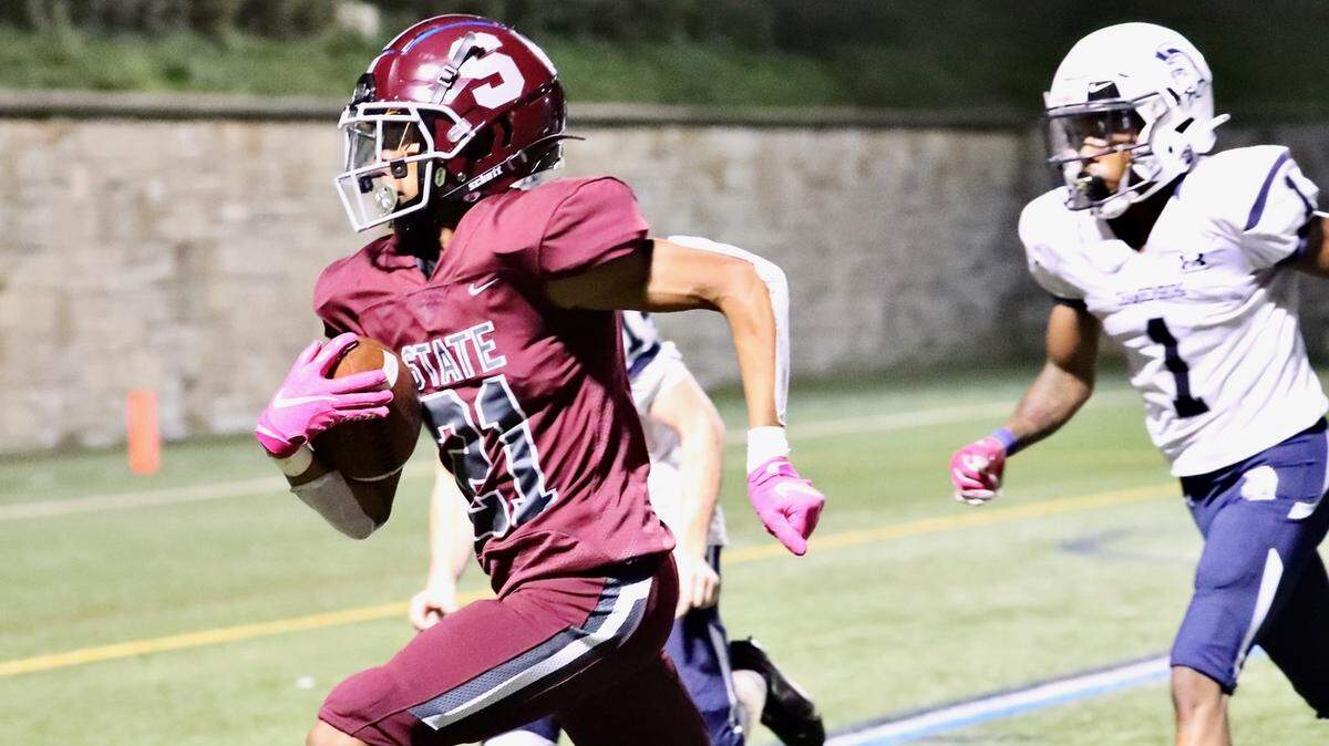 State College’s Donte Nastasi runs into the end zone against Chambersburg at Memorial Field on Sept. 17, 2021. State College won, 38-22.