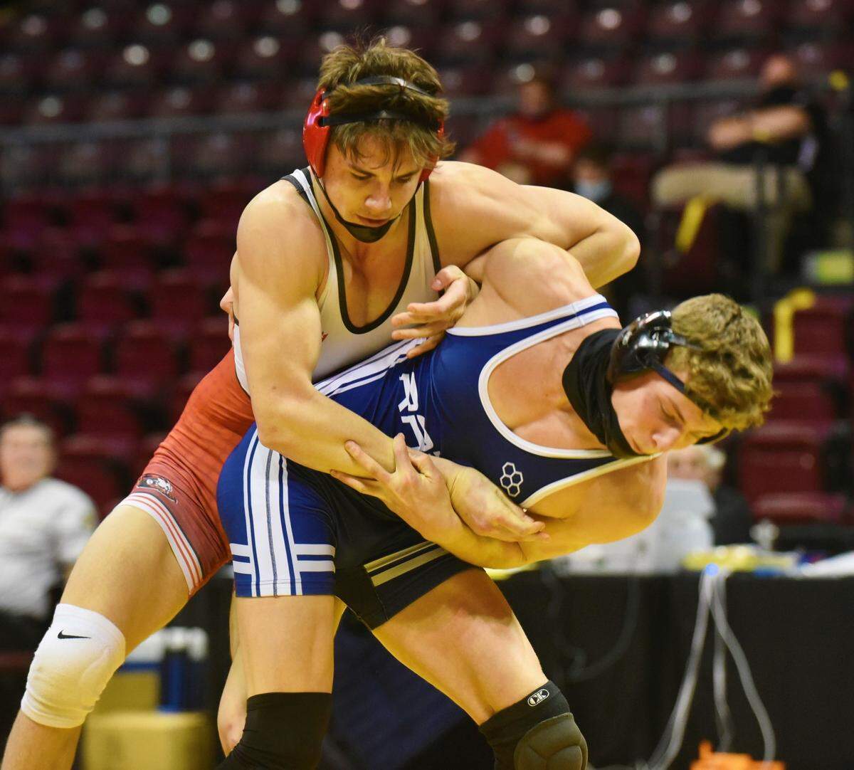 Penns Valley’s Malachi DuVall goes to throw Frazier’s Rune Lawrence in their 172-pound finals match during the PIAA Class 2A Southwest Regional tournament on Saturday at Indiana University of Pennsylvania. Lawrence pinned DuVall in 5:37.