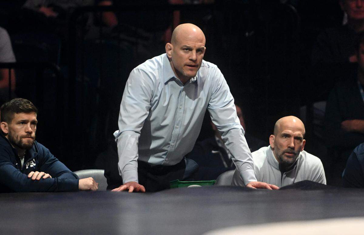 Penn State wrestling coach Cael Sanderson watches the 285 lb bout between Greg Kerkvliet and Michigan’s Mason Parris during the match on Friday, Jan. 20, 2023 at the Bryce Jordan Center.