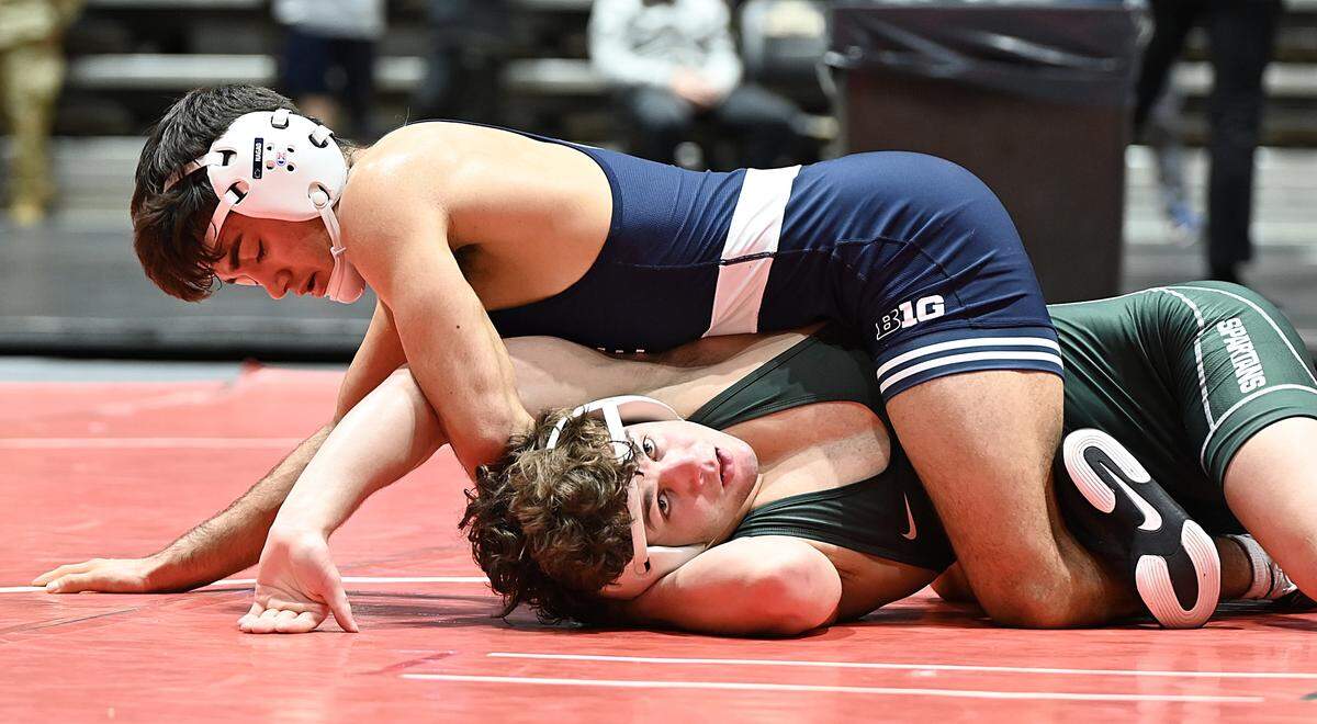 Penn State’s Aaron Nagao scores nearfall points on Michigan State’s Andrew Hampton in their 133-pound quarterfinals match of the Black Knight Invite on Sunday inside Christl Arena at West Point, N.Y. Nagao, who was making his Nittany Lions debut, beat Hampton, 13-1.