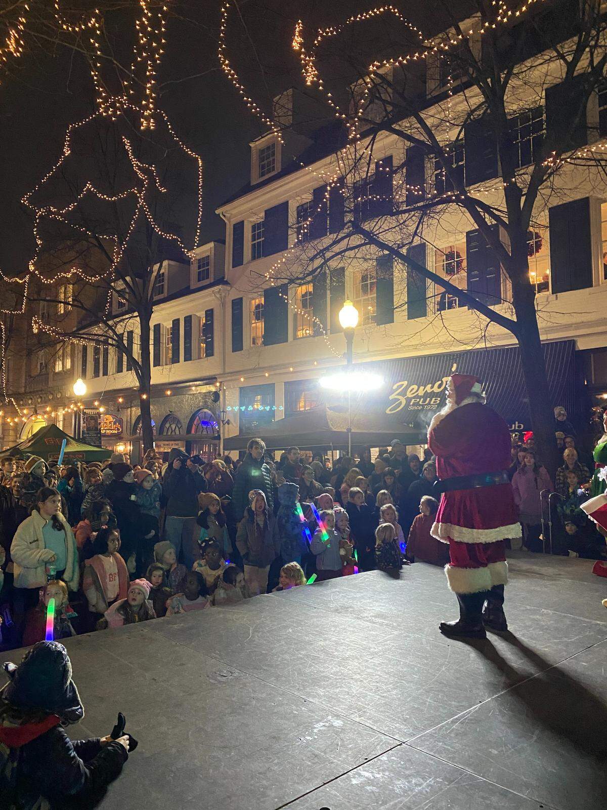 Santa takes the stage in front of hundreds during Light Up Night in downtown State College on Wednesday, Nov. 20, 2025.