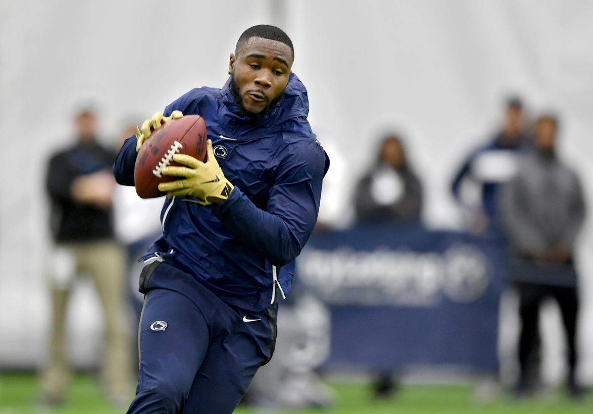 Running back Miles Sanders makes a catch during Pro day on Tuesday, March 19, 2019 at Holuba Hall.