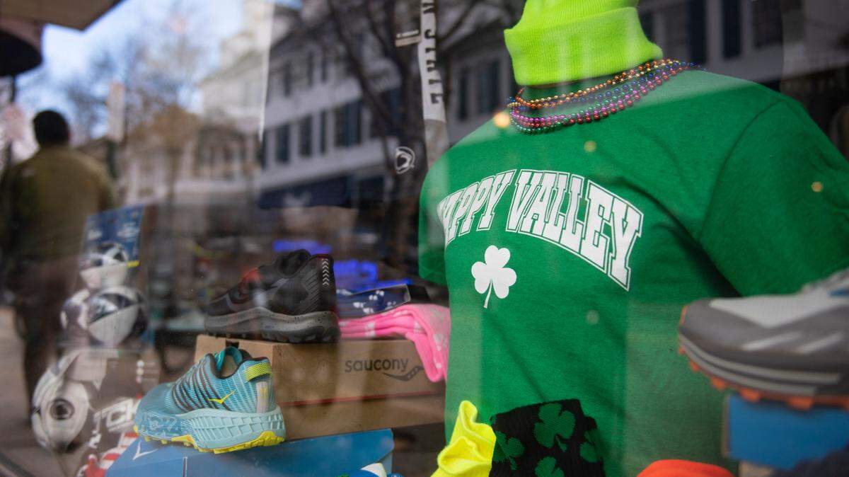 A State Paddy’s Day themed shirt sits in the window of Rapid Transit Sports on Feb. 23, 2022 in State College.