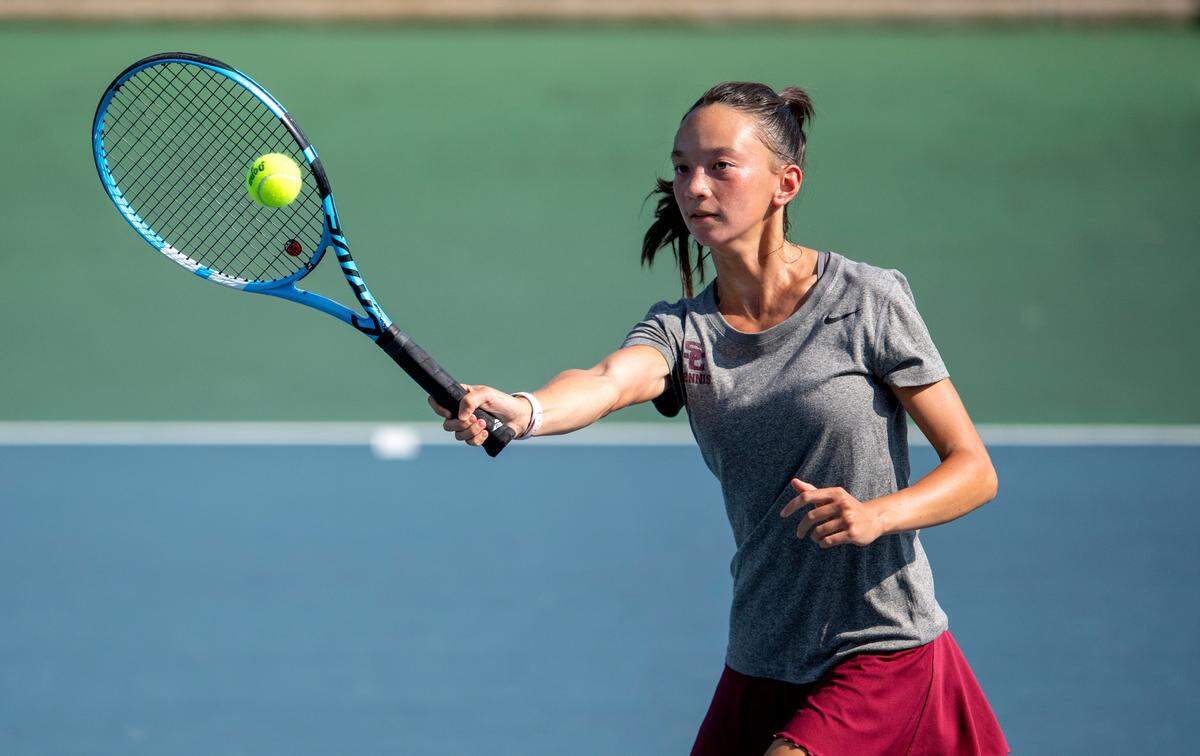 State College’s Madeline Miller returns the ball during the girls tennis match against Red Land on Thursday, Aug. 26, 2021.