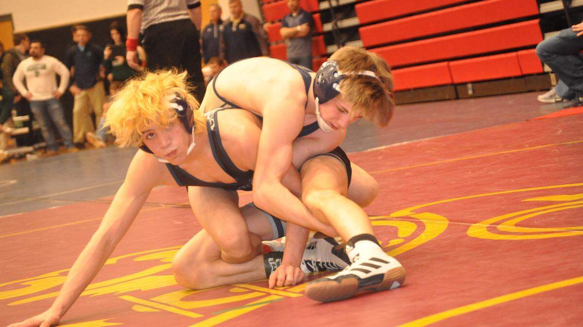 Bald Eagle Area’s Coen Bainey controls Burgettstown’s Dylan Slovick during their 120-pound quarterfinals bout of the PIAA Class AA Southwest Regional Friday, March 4, 2022.
