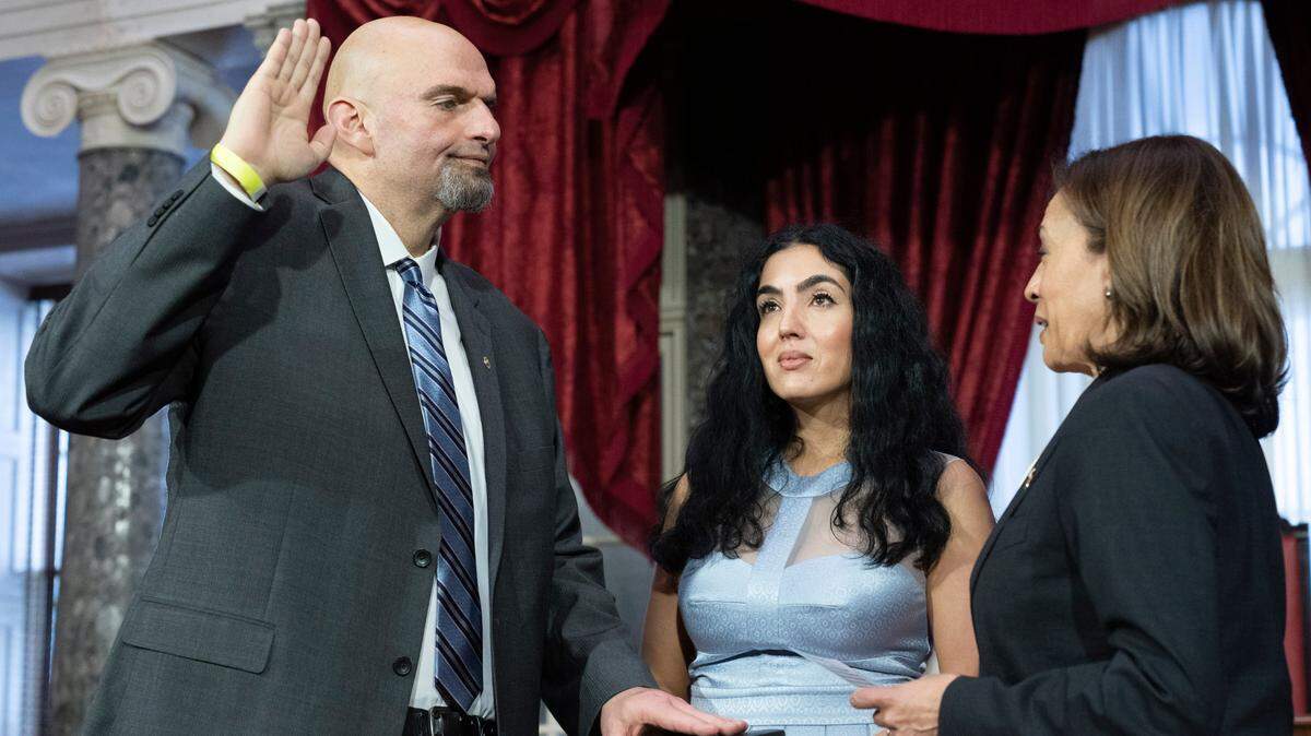 Vice President Kamala Harris, right, participates in a ceremonial swearing-in of Sen. John Fetterman, D-Pa., left, with his wife Gisele Barreto Fetterman, in the Old Senate Chamber on Capitol Hill in Washington, Tuesday, Jan. 3, 2023.
