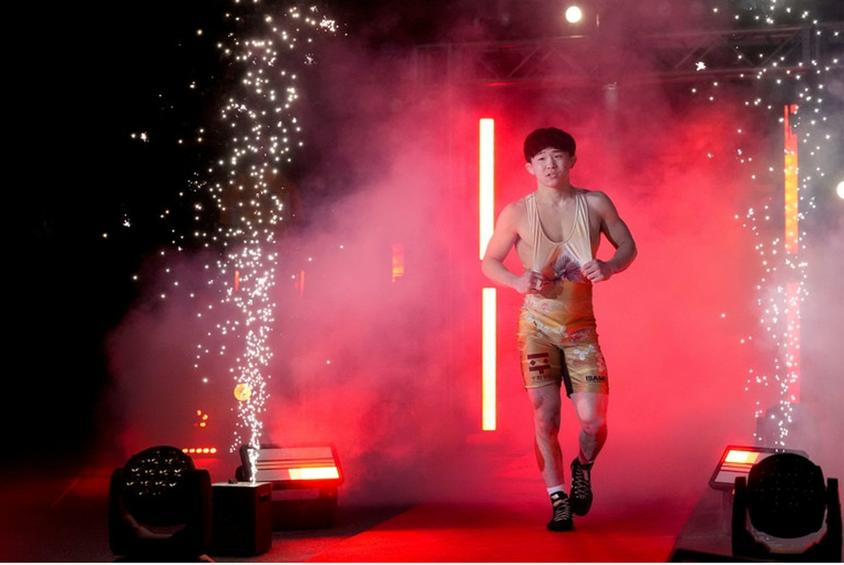 Masanosuke Ono is announed during an exhibition match against Spencer Lee at the “FloWrestling Night in America” event Wednesday, Feb. 26, 2025 at Xtream Arena in Coralville, Iowa.