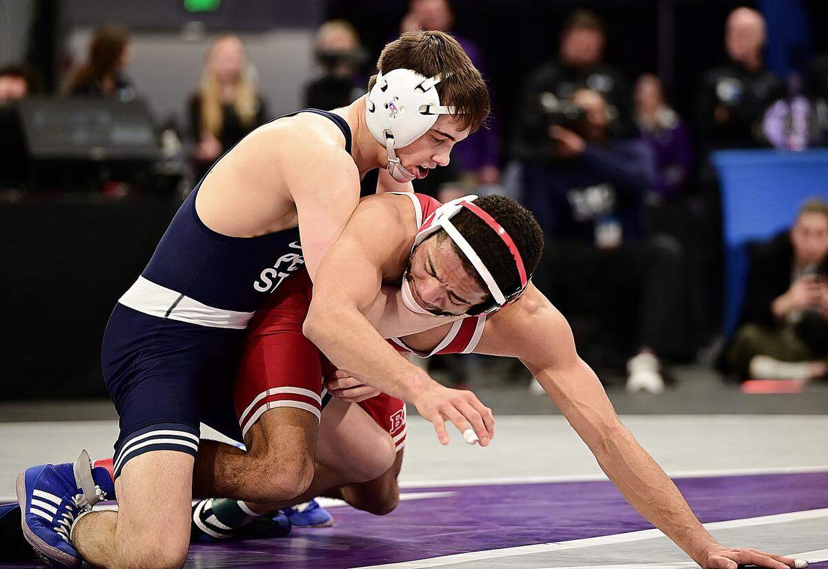 Penn State’s Luke Lilledahl controls Nebraska’s Caleb Smith in their 125-pound finals match of the Big Ten championships on March 8 inside Welsh Ryan Arena in Evanston, Ill. Lilledahl topped Smith, 4-3, for his first conference title.