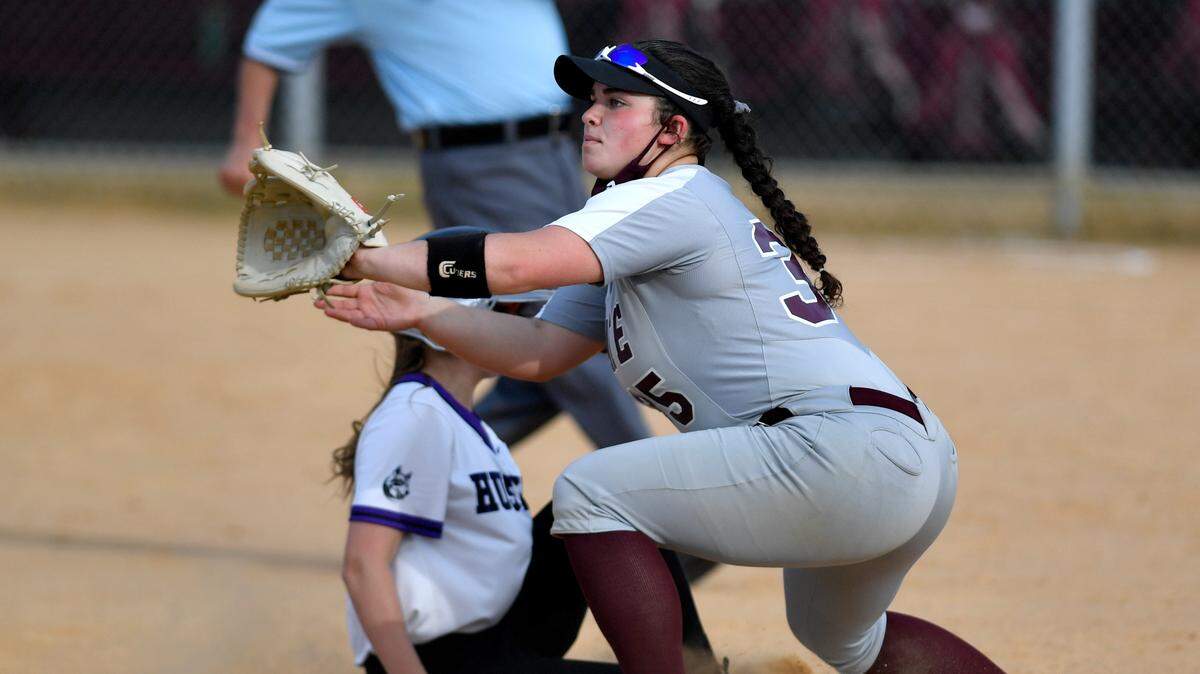 State College’s Logan Soltis waits for the throw as a Mifflin County runner safely arrives at third during the game against Mifflin County on Tuesday, April 27, 2021.