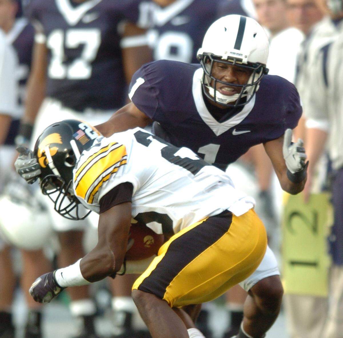 Justin King tackles Iowa’s Paul Chaney Jr. Penn State beat Iowa 27-7 on Saturday, October 6, 2007. 