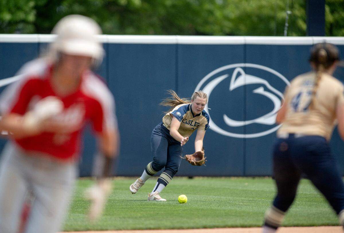 Bald Eagle Area’s Sydney Thompson fields the ball as an Everett runner rounds third during the PIAA class 2A championship game against Everett at Beard Field on Thursday, June 15, 2023.