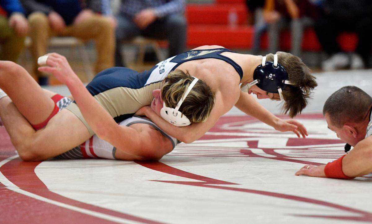 Bald Eagle Area’s Coen Bainey controls Bellefonte’s Noah Weaver to get the pin in the 126 lb bout of the match on Tuesday, Dec. 14, 2021.