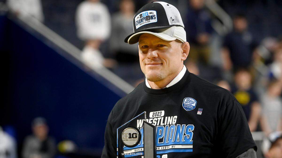 Penn State wrestling coach Cael Sanderson is named the coach of the year at the Big Ten wrestling championships on Sunday, March 5, 2023.