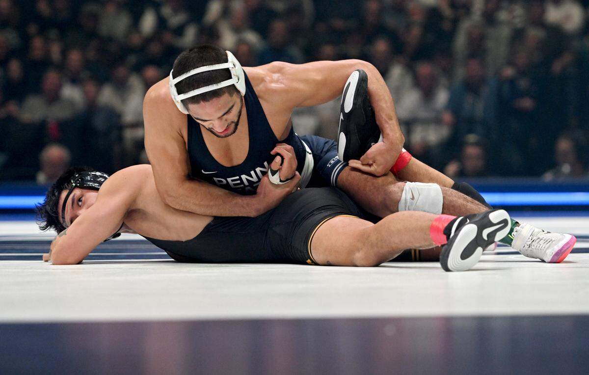 Penn State’s Shayne Van Ness controls Iowa’s Kyle Parco in the 149 lb bout of the match on Friday, Jan. 31, 2025 at the Bryce Jordan Center.
