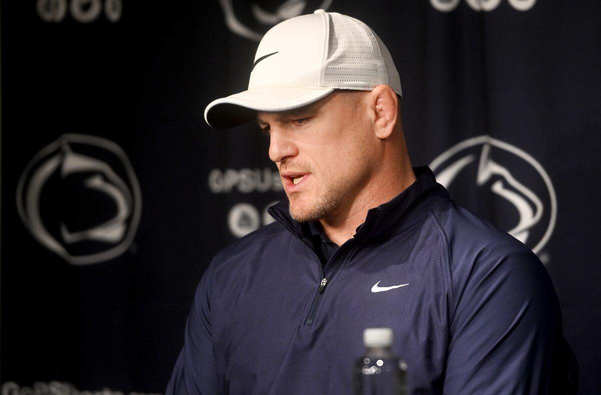 Penn State wrestling coach Cael Sanderson answers questions during the first availability of the season on Wednesday, Nov. 8, 2023.
