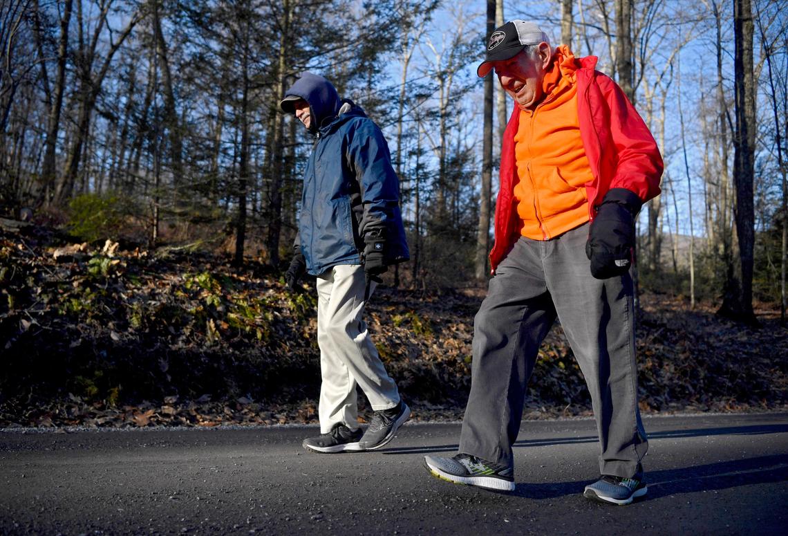 George Etzweiler and one of his running buddies, Jay Maynard, make their way up Laurel Run Road for their workout on Thursday, March 5, 2020.