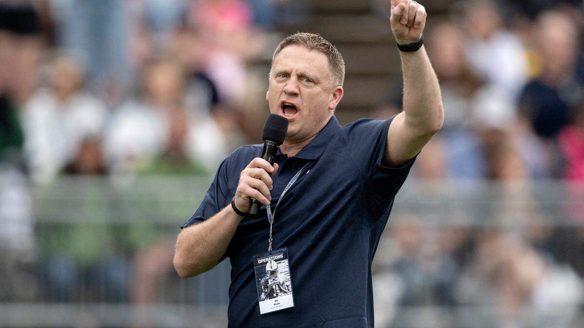 Penn State men’s basketball coach Mike Rhoades leads fans in a “we are” chant during the Penn State Blue-White game on Saturday, April 15, 2023.