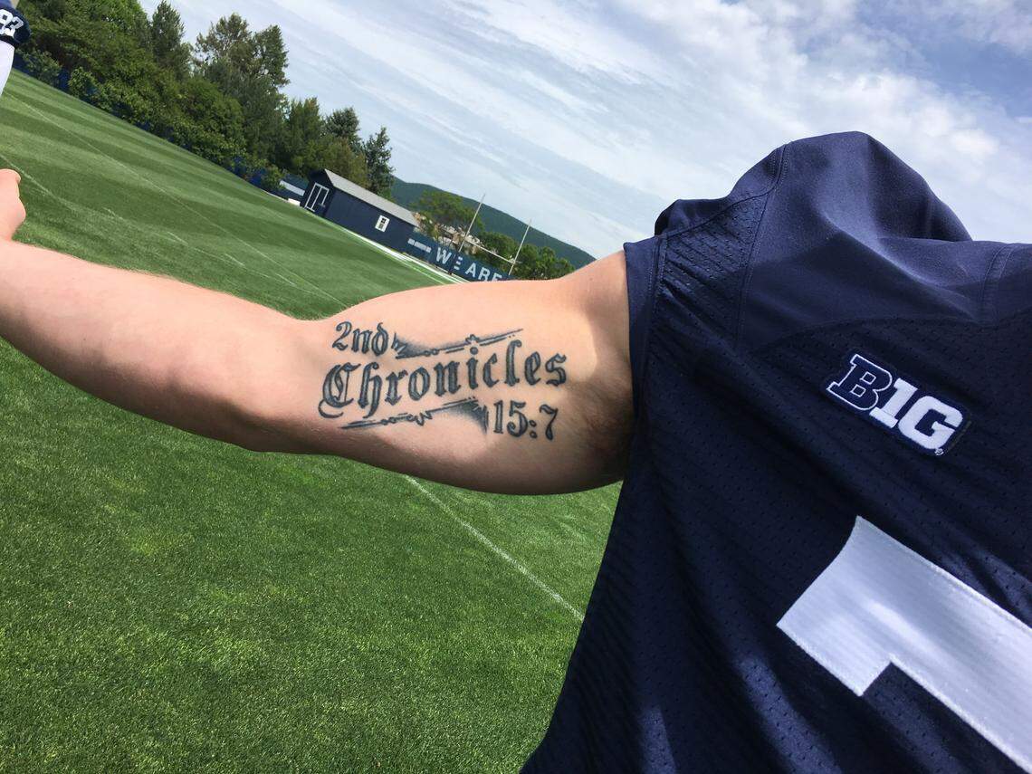 Penn State quarterback Will Levis displays the tattoo on his right arm. The bible verse — “Be strong and do not give up” —&nbsp;is meaningful for Levis and his family.