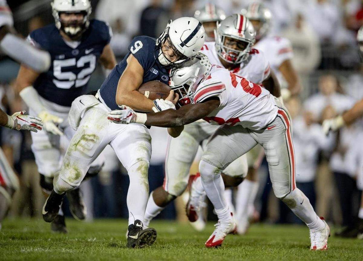Ohio State safety Jahsen Wint hits Penn State quarterback Trace McSorley during the game on Saturday, Sept. 29, 2018 at Beaver Stadium.