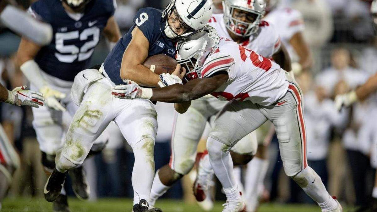 Ohio State safety Jahsen Wint hits Penn State quarterback Trace McSorley during the game on Saturday, Sept. 29, 2018 at Beaver Stadium.