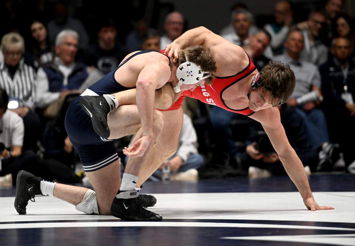 Penn State’s Bernie Truax wrestles Ohio State’s Ryder Rogotzke 184 lb bout during the match on Friday, Feb. 2, 2024 in Rec Hall.
