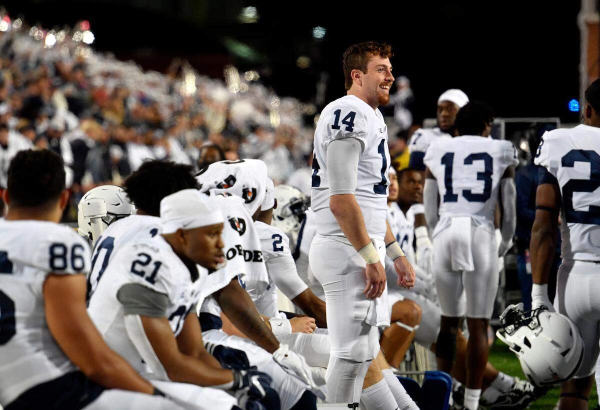 Penn State quarterback Sean Clifford starts to celebrate in the final minutes of the game against Maryland Saturday, Nov. 6, 2021.