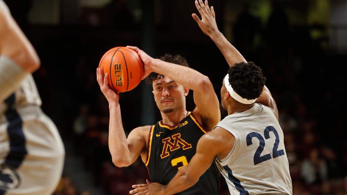 Penn State guard Jalen Pickett defends Minnesota forward Dawson Garcia during the first half Saturday, Feb. 18, 2023, in Minneapolis.