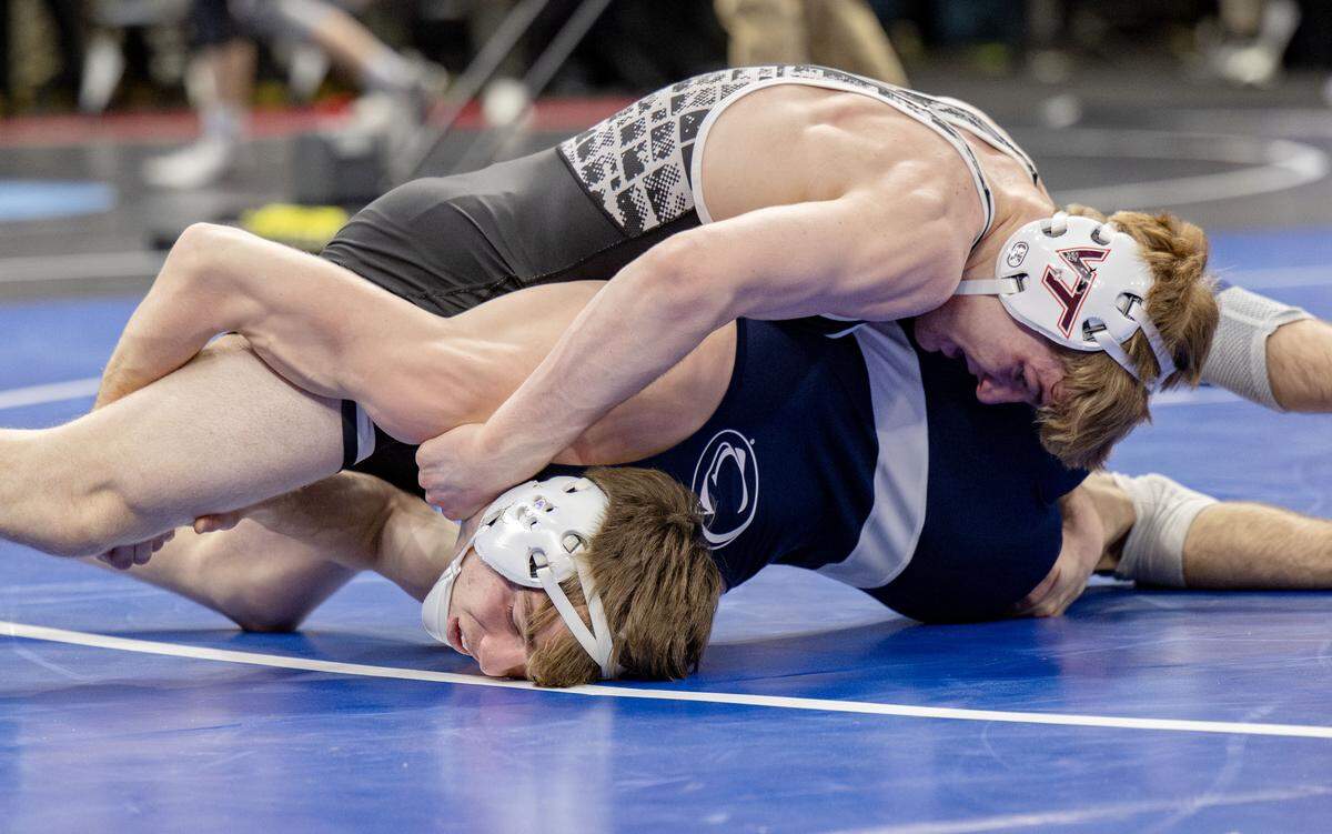 Virginia Tech's Aaron Seidel controls Penn State's Marcus Blaze in the 133-pound bronze medal match at the NCAA wrestling championships on Saturday, March 21, 2026.