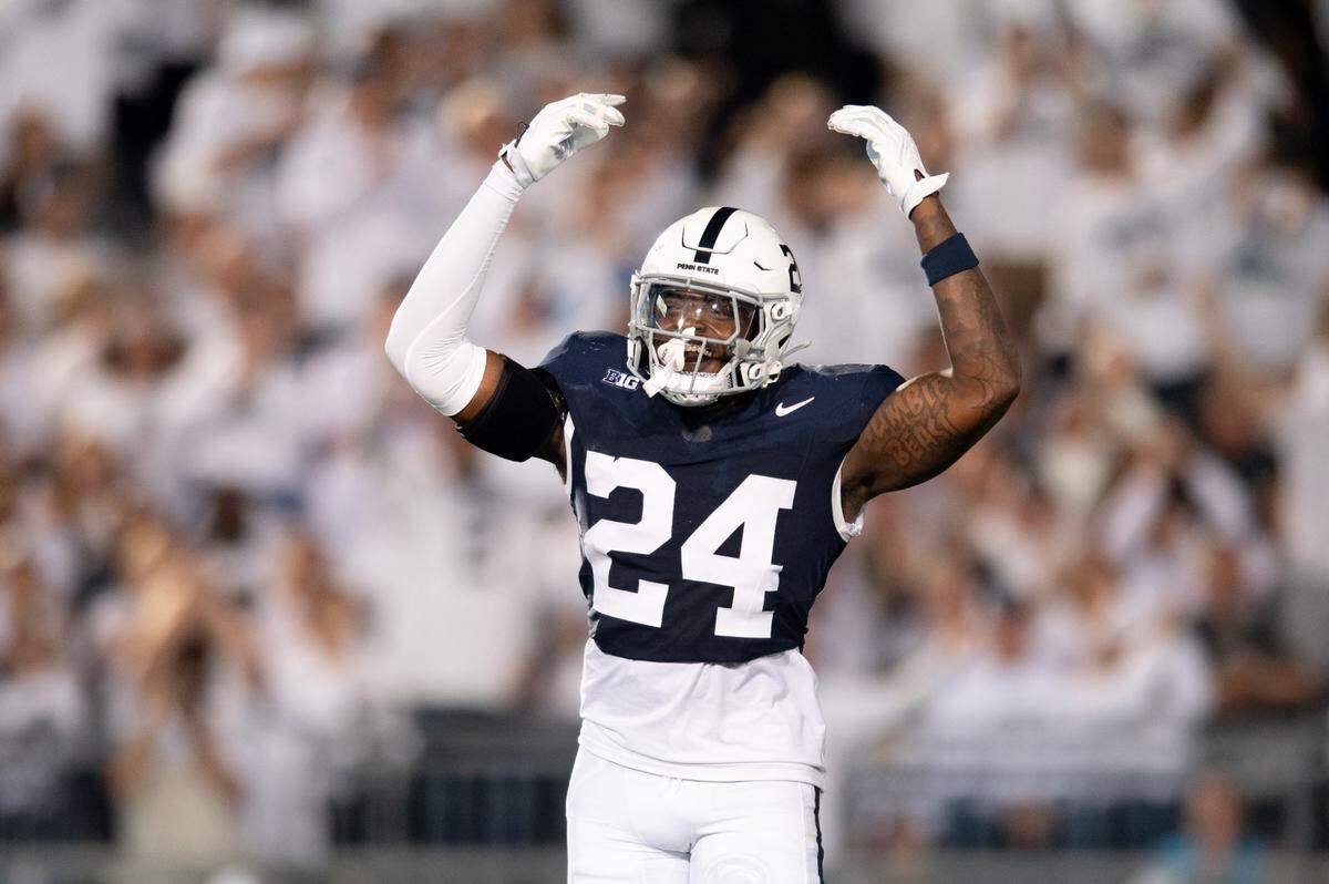 Penn State Nittany Lions linebacker Ta’Mere Robinson celebrates stopping a run during the football game against Illinois at Beaver Stadium on Saturday.