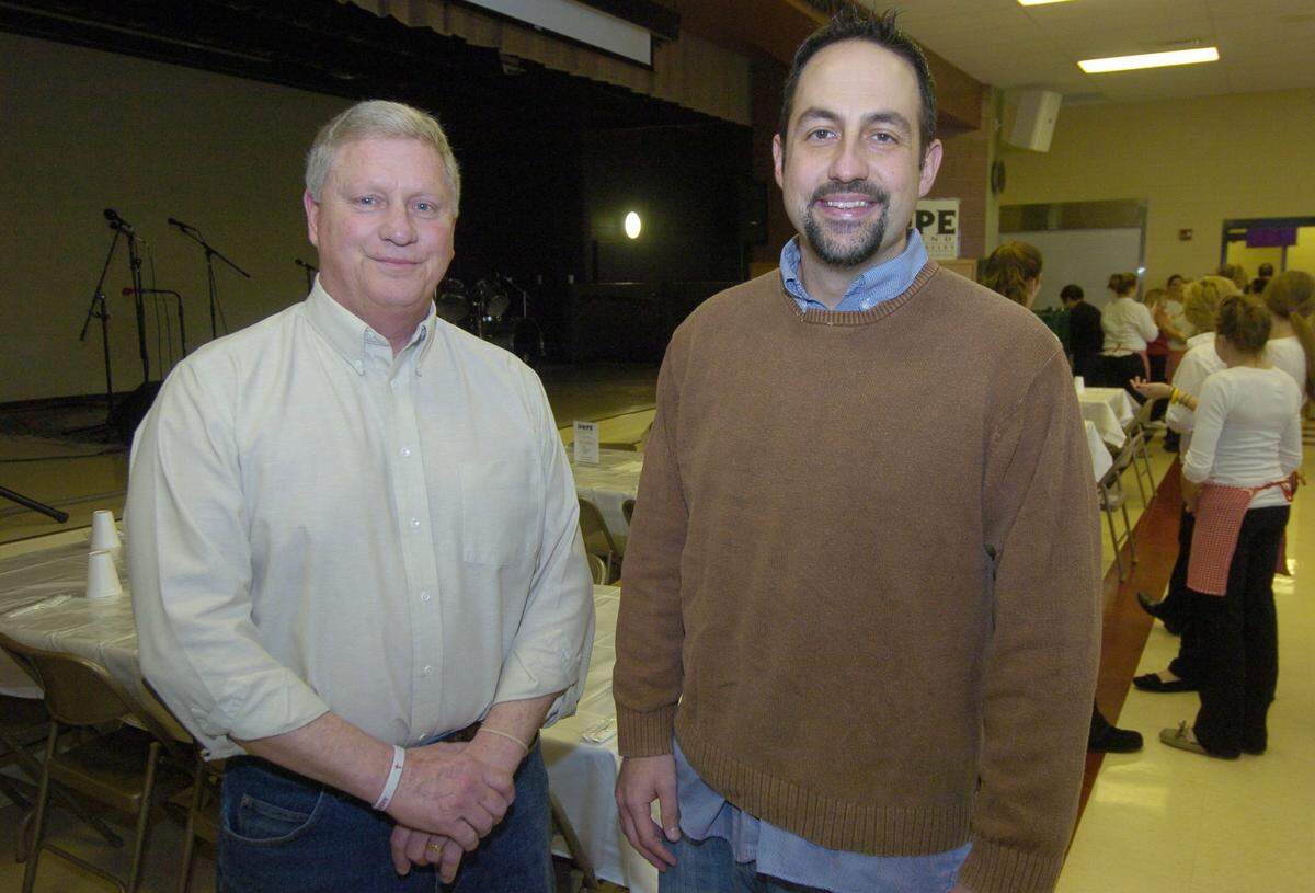 The Hope Fund of Penns Valley president Dan Gensimore, left, and vice-president T.J. Coursen during their All You Can Eat Spaghetti Dinner fundraiser in January 2010.
